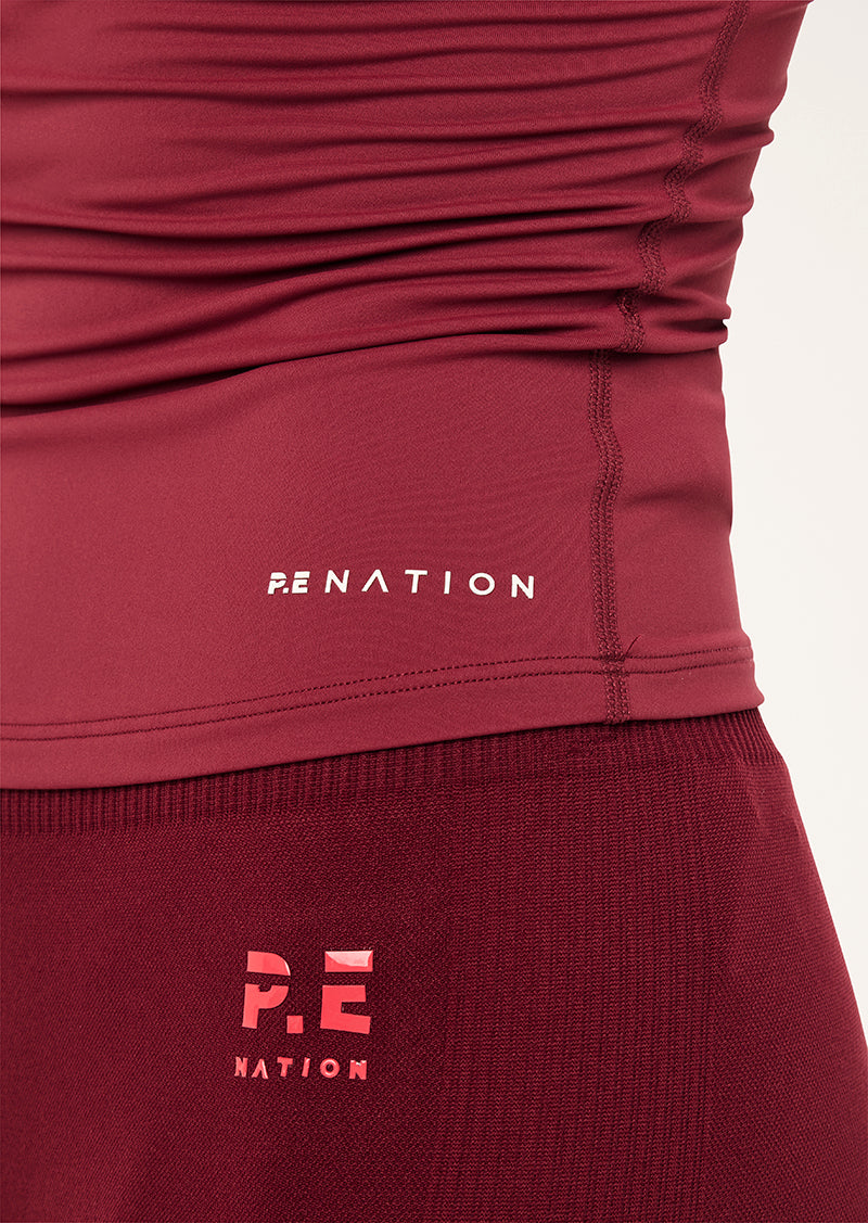 FOUNDATION LONG SLEEVE TOP IN CABERNET BY P.E NATION, WOMEN'S ATHLEISURE LONG SLEEVE TOPS