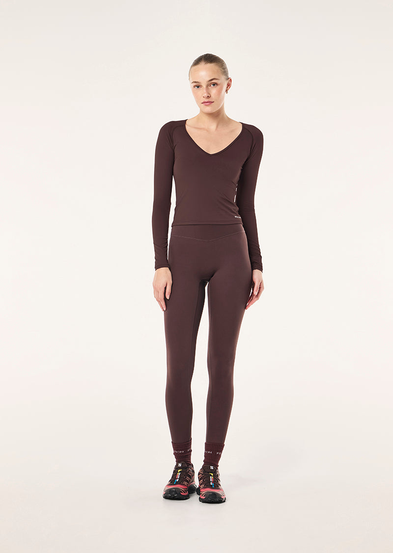FOUNDATION V NECK LONG SLEEVE TOP IN DARK PLUM BY P.E NATION, WOMEN'S ATHLEISURE LONG SLEEVE TOP