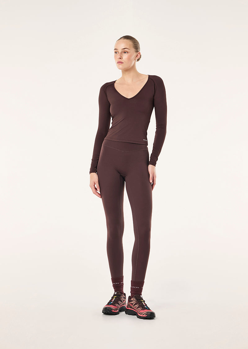 FOUNDATION V NECK LONG SLEEVE TOP IN DARK PLUM BY P.E NATION, WOMEN'S ATHLEISURE LONG SLEEVE TOP