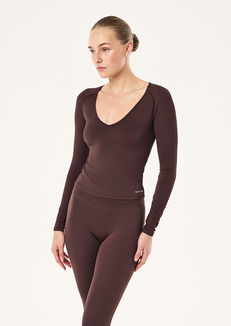 FOUNDATION V NECK LONG SLEEVE TOP IN DARK PLUM BY P.E NATION, WOMEN'S ATHLEISURE LONG SLEEVE TOP