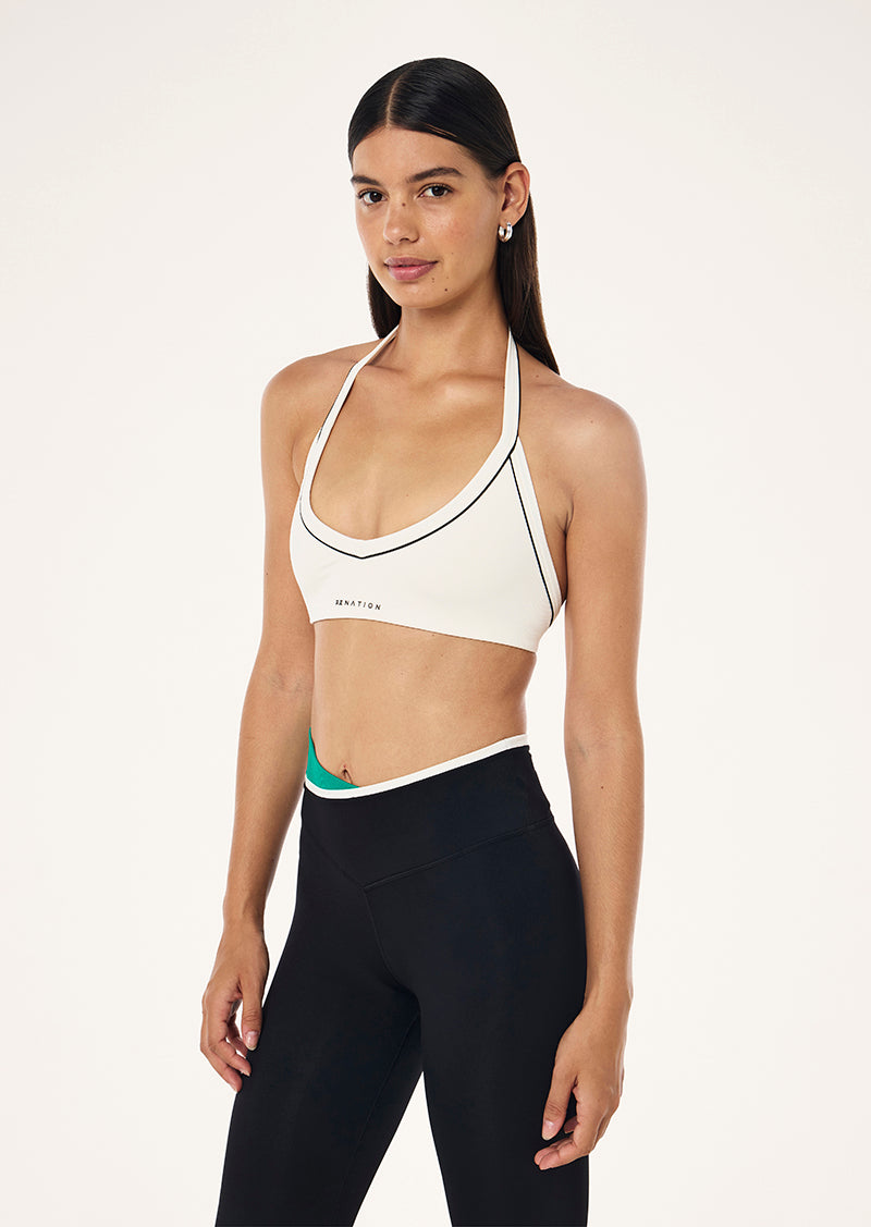 LAYBACK HALTER SPORTS BRA IN WHISPER WHITE BY P.E NATION, WOMEN'S ATHLEISURE SPORTS BRA