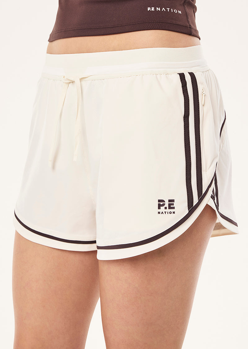 LINEAR RUNNING SHORT IN WHISPER WHITE BY P.E NATION, WOMEN'S RUNNING SHORT