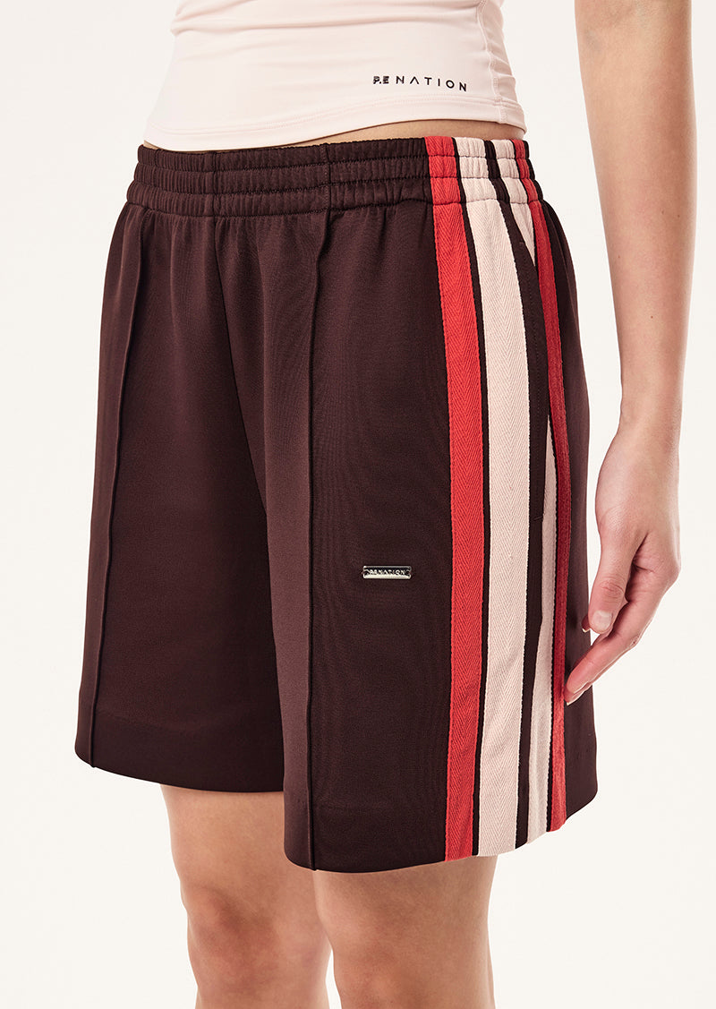 MAN DOWN TRACK SHORT IN DARK PLUM BY P.E NATION, WOMEN'S ATHLEISURE TRACK SHORTS
