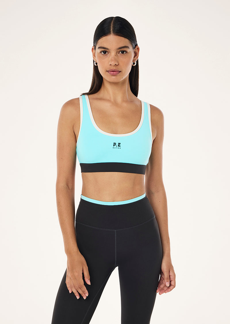 PURSUIT SPORTS BRA IN AQUA BY P.E NATION