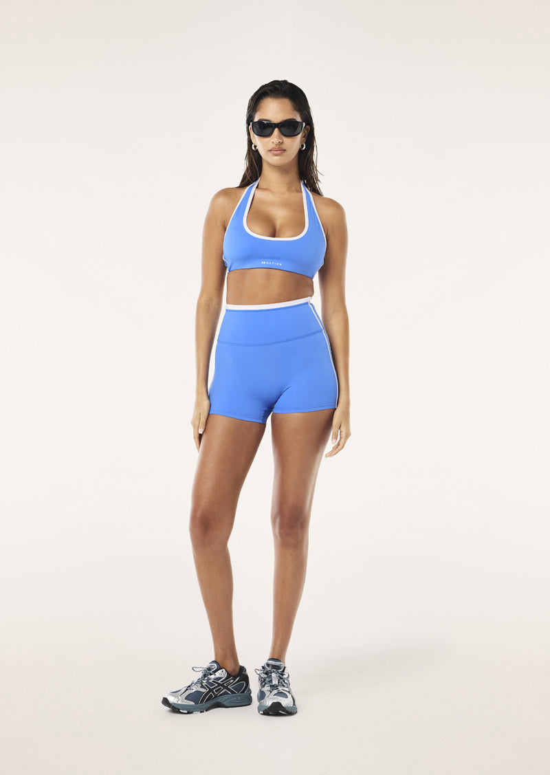 RADAR HALTER SPORTS BRA IN PALACE BLUE BY P.E NATION WOMENS ATHLEISURE SPORTS BRA