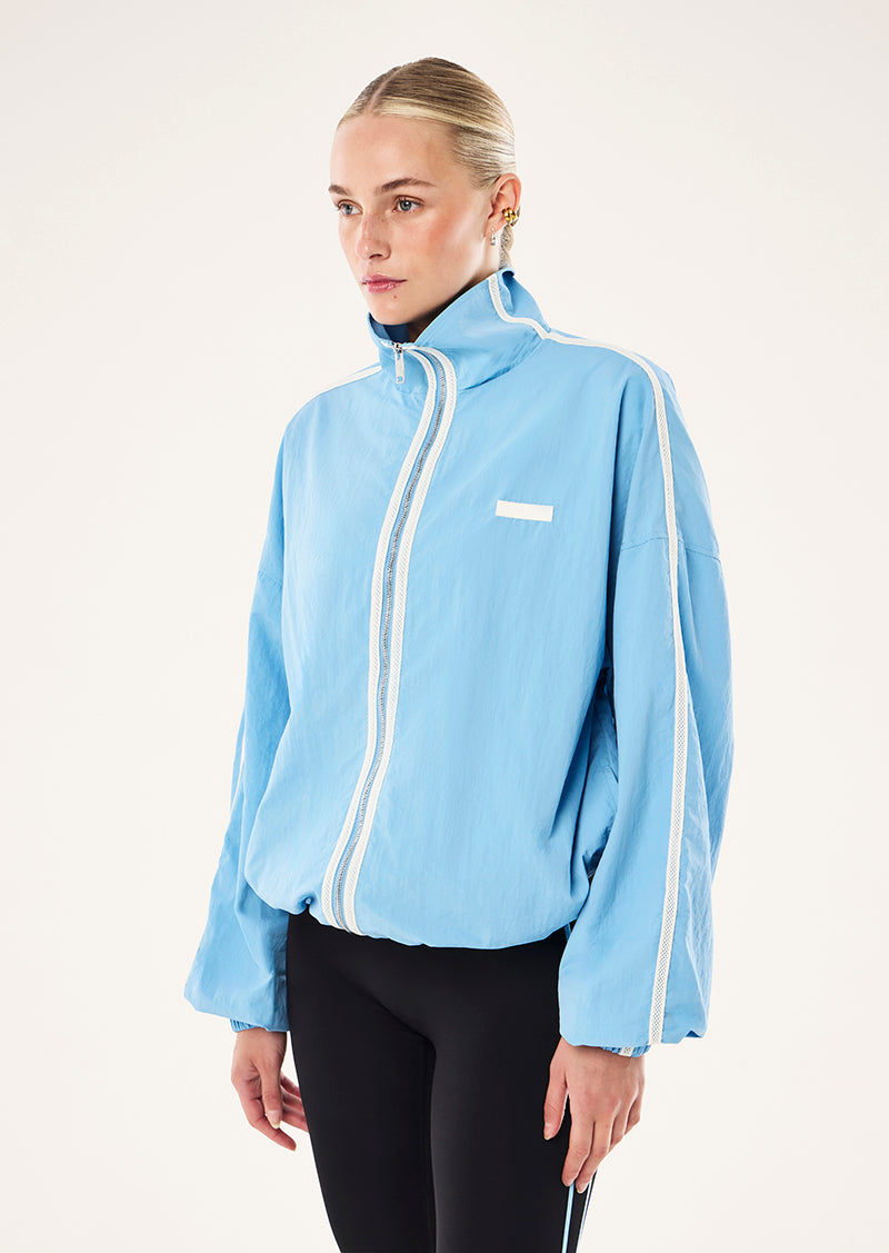 RADIUS JACKET IN ALASKAN BLUE BY P.E NATION, WOMEN'S ATHLEISURE SPRAY JACKETS