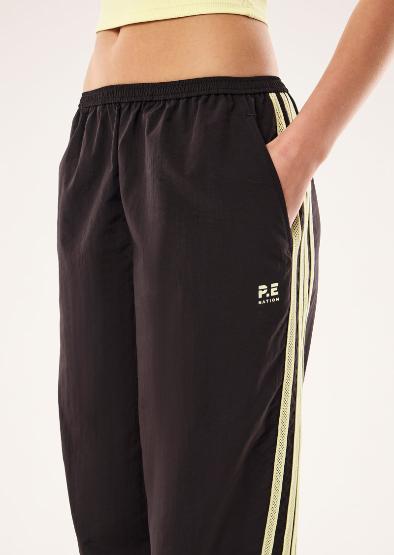 RADIUS PANT IN BLACK BEAN AND SOFT YELLOW BY P.E NATION, WOMEN'S TRACKPANT