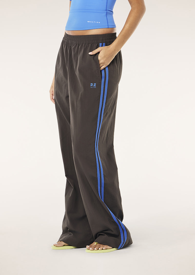 RELAY SPRAY TRACK PANT IN COFFEE BY P.E NATION WOMENS TRACK PANT
