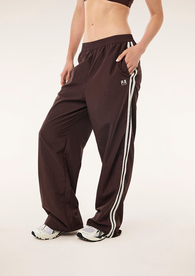 RELAY SPRAY TRACK PANT IN MAHOGANY