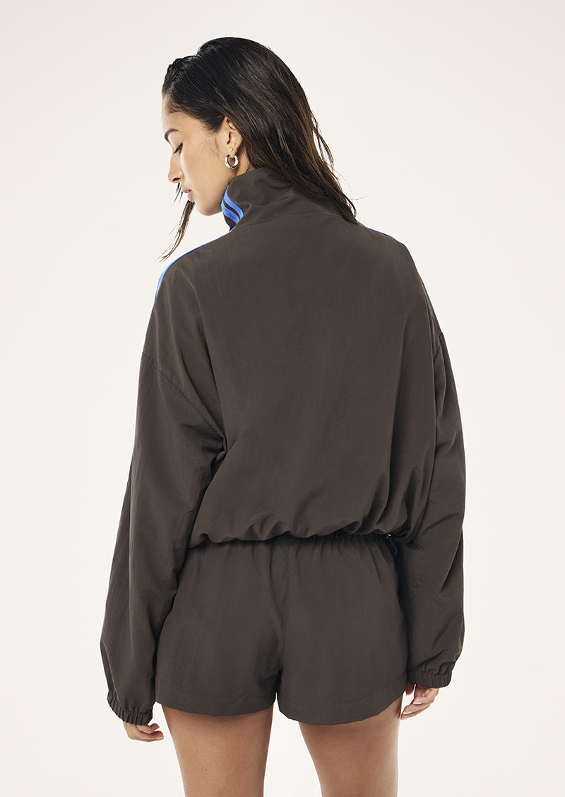 RELAY SPRAY JACKET IN COFFEE BY P.E NATION WOMENS ATHLEISURE WIND JACKET