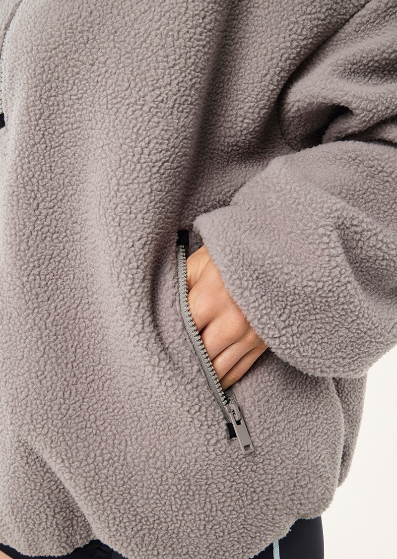 ROTATE QUARTER ZIP IN GREY