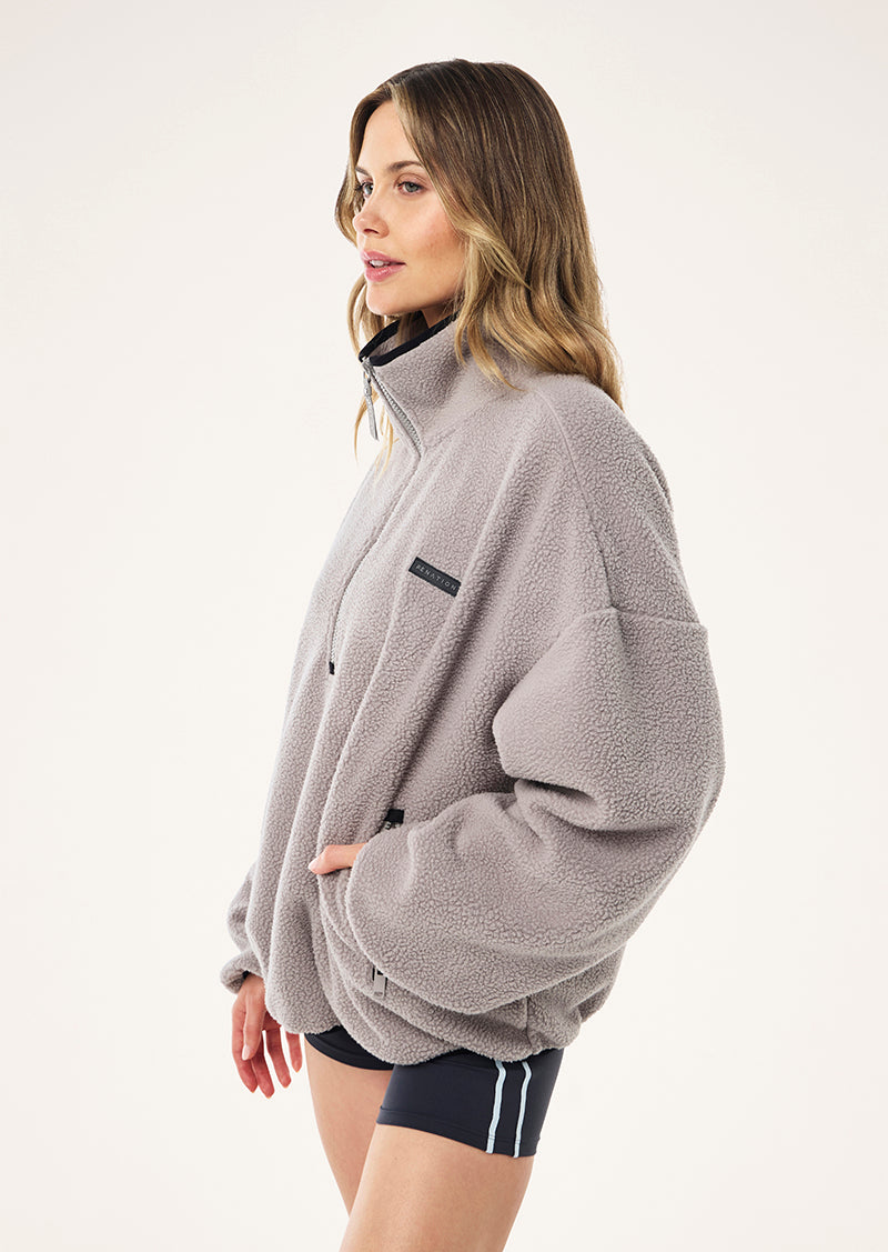 ROTATE QUARTER ZIP IN GREY