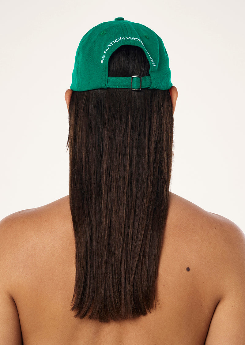 SHIFT CAP IN COLLEGE GREEN AND OPTIC WHITE BY P.E NATION, WOMEN'S ATHLEISURE CAPS