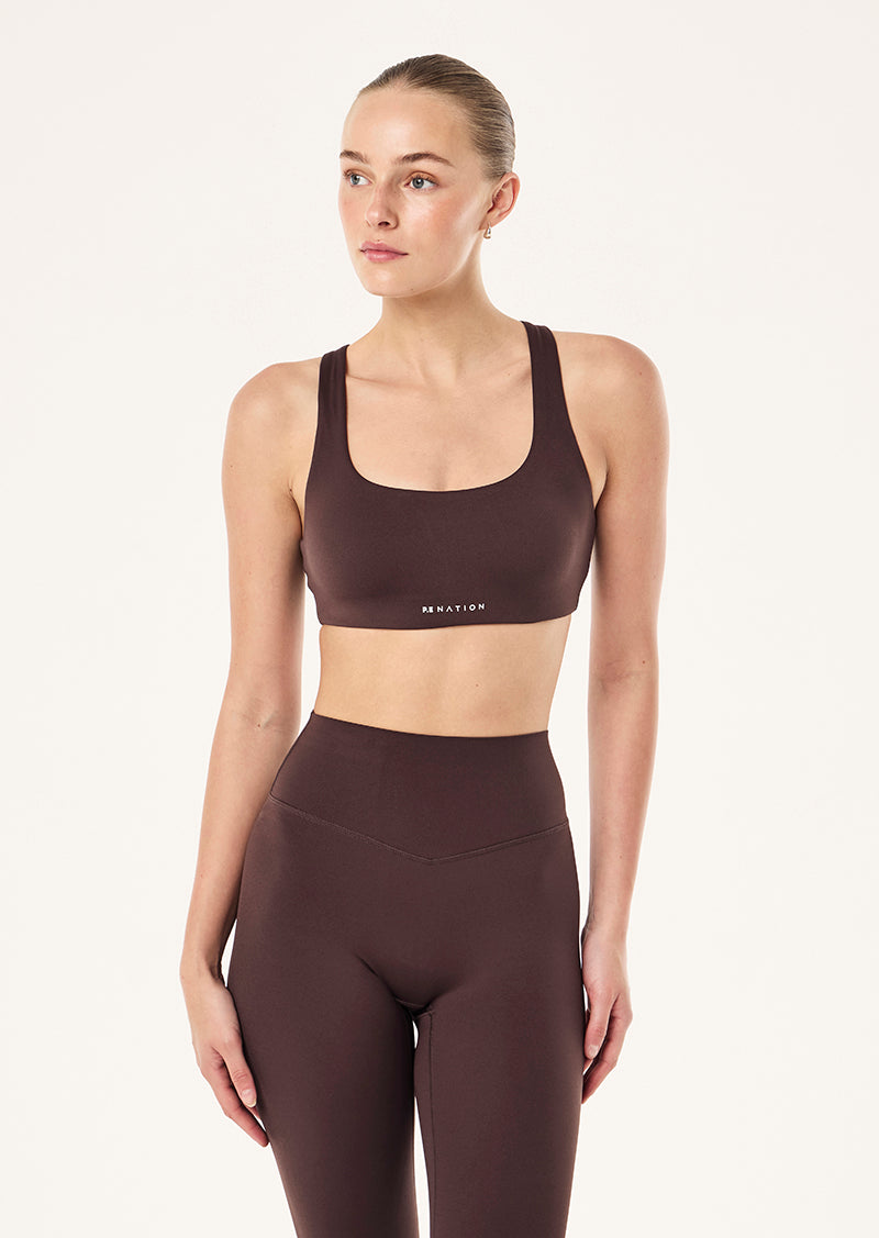 SIGNATURE SCOOP SPORTS BRA IN DARK PLUM BY P.E NATION