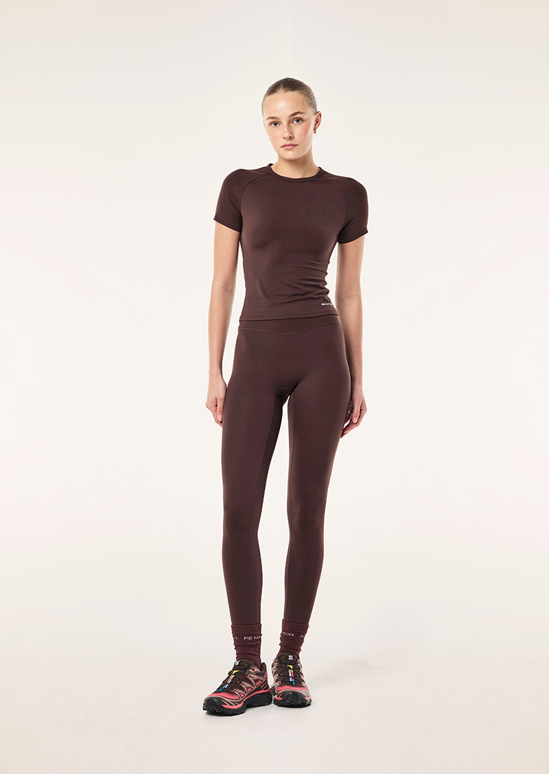 SIGNATURE SHORT SLEEVE TEE IN DARK PLUM BY P.E NATION, WOMEN'S PILATES SHORT SLEEVE TEES