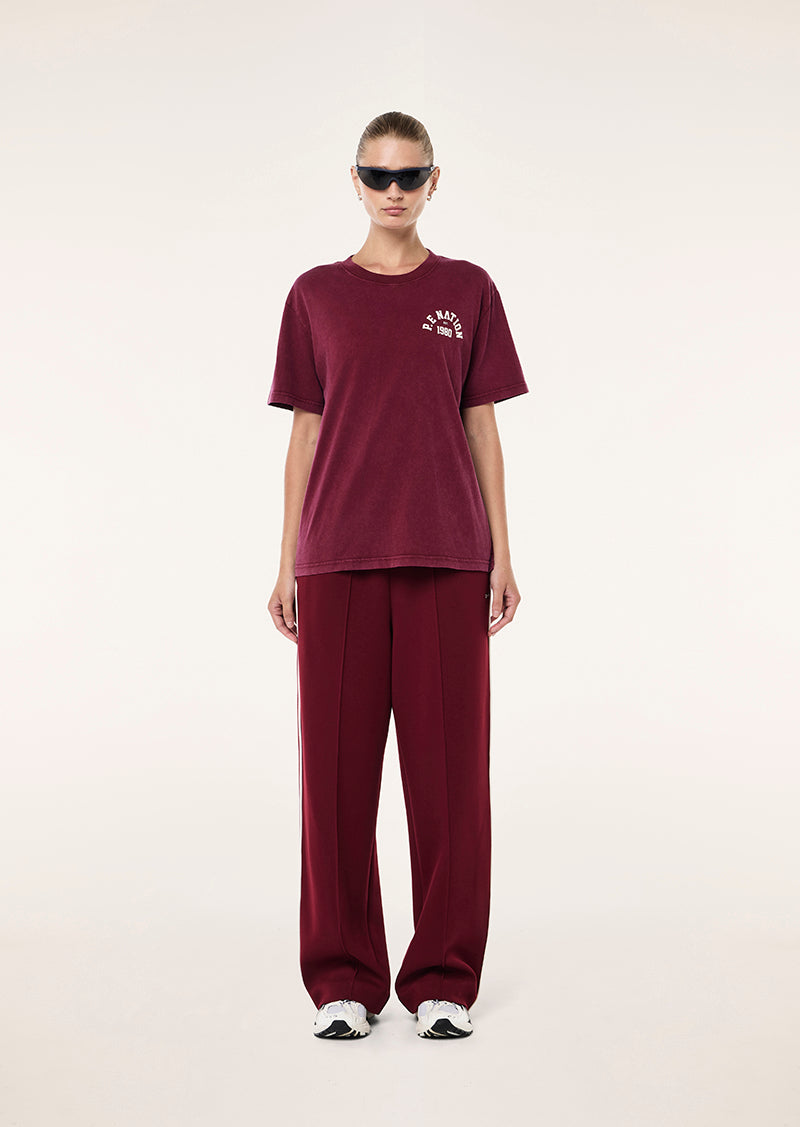 SWERVE TEE IN WASHED CABERNET BY P.E NATION, WOMEN'S ATHLEISURE TEES