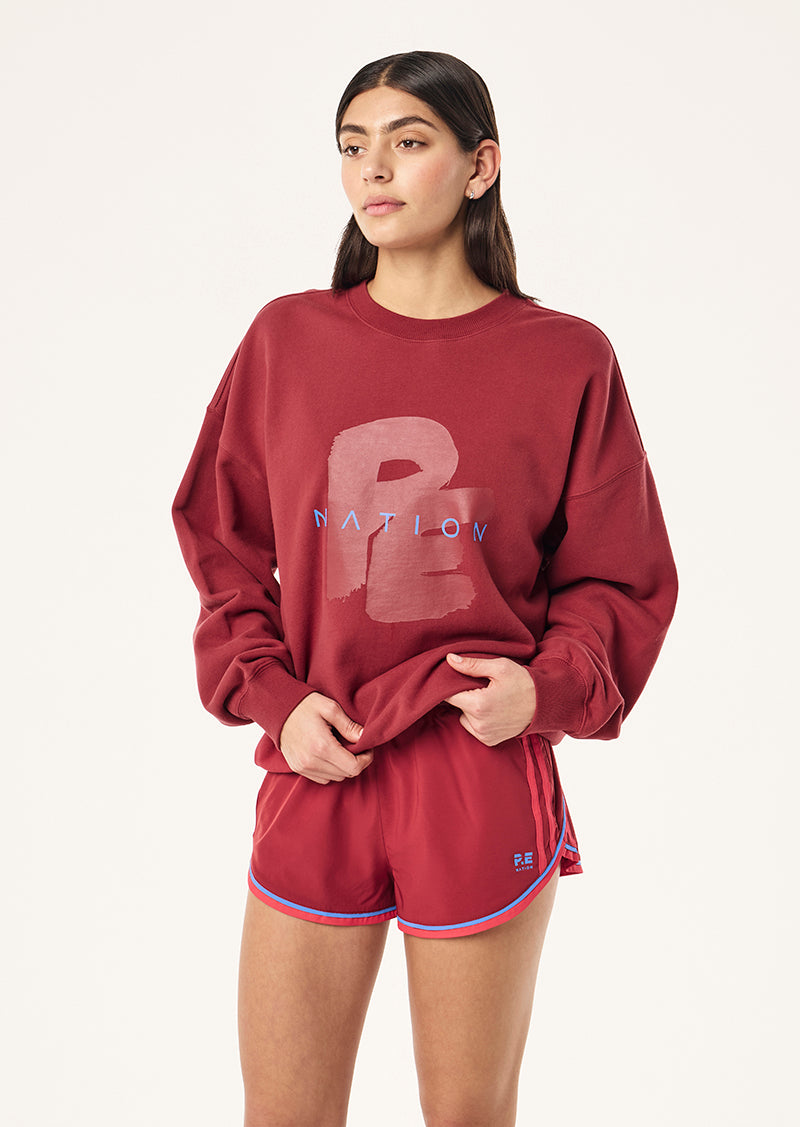 TIDAL OVERSIZED SWEAT IN CHERRY BY P.E NATION