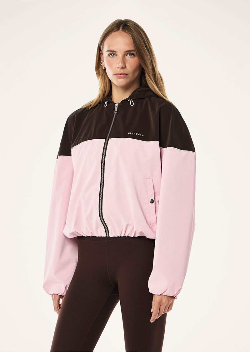 VERTEXT JACKET IN ESPRESSO BY P.E NATION, WOMENS ATHLEISURE SPRAY JACKET BROWN