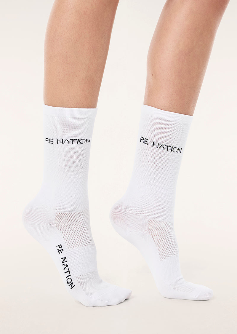 AERO RUNNING SOCK IN WHITE BY P.E NATION