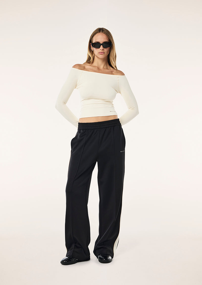 AURA LONG SLEEVE TOP IN WHISPER WHITE BY P.E NATION, WOMENS ATHLEISURE ACTIVE TOP CREAM