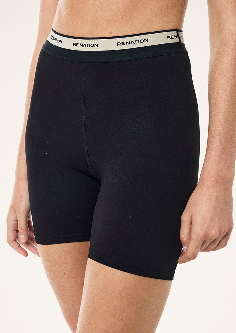 AVANT 5 INCH BIKE SHORT IN BLACK AND BISCUIT BY P.E NATION WOMENS ATHLEISURE BIKE SHORT