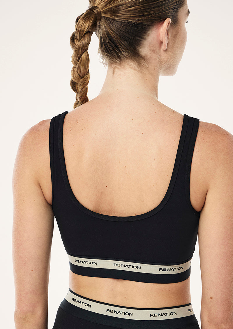AVANT SCOOP SPORTS BRA IN BLACK AND BISCUIT BY P.E NATION WOMENS ATHLEISURE SPORTS BRA