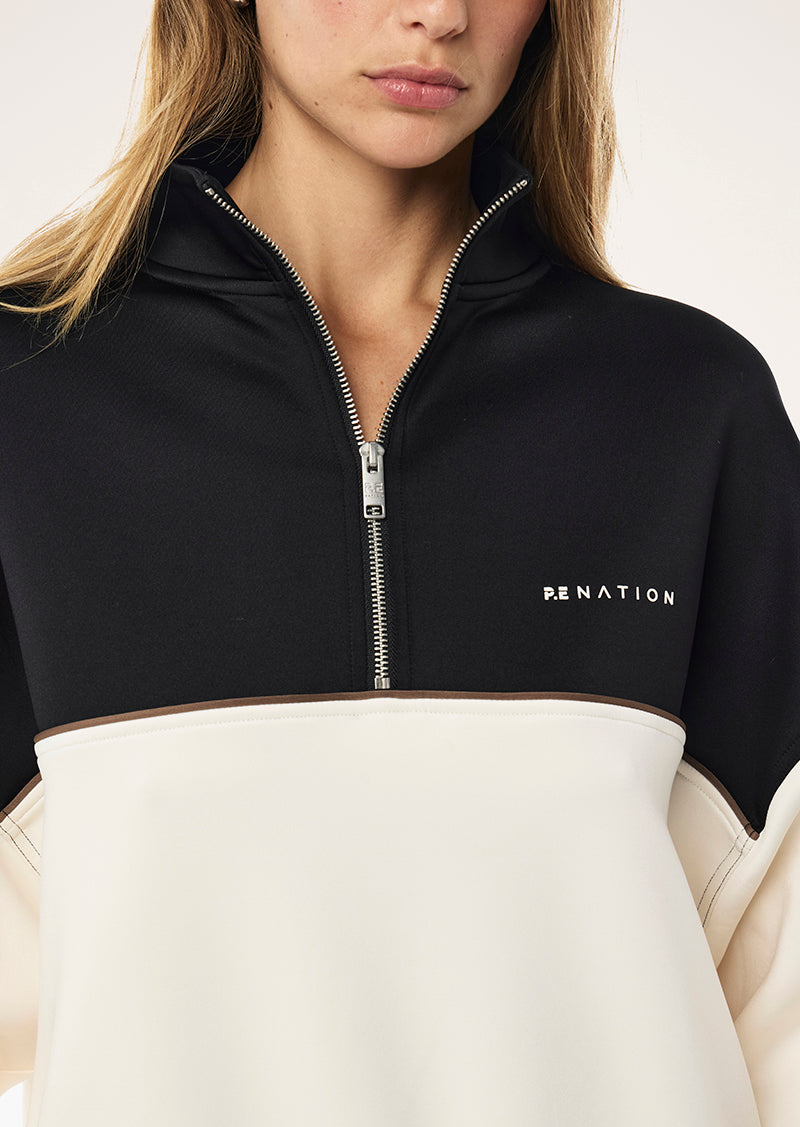 BOUNDLESS ZIP NECK SWEAT IN WHISPER WHITE BY P.E NATION, WOMENS ATHLEISURE QUARTER ZIP SWEAT TOP CREAM