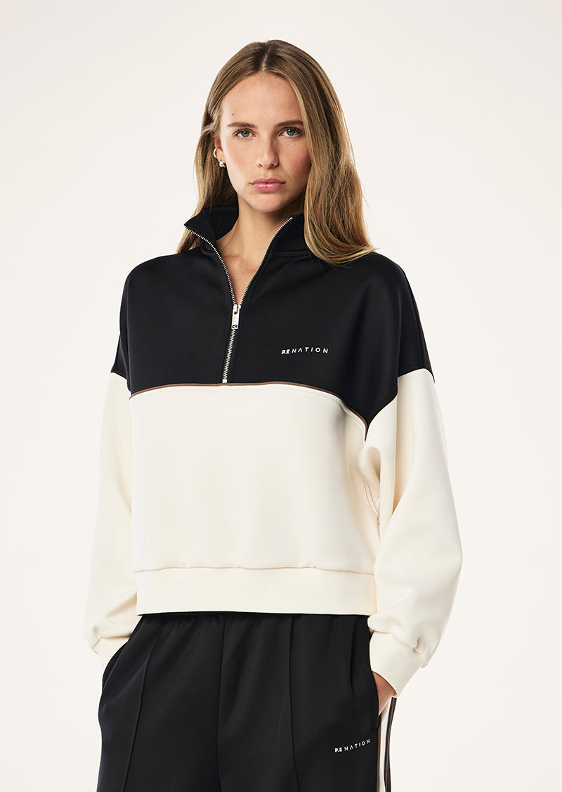 BOUNDLESS ZIP NECK SWEAT IN WHISPER WHITE BY P.E NATION, WOMENS ATHLEISURE QUARTER ZIP SWEAT TOP CREAM