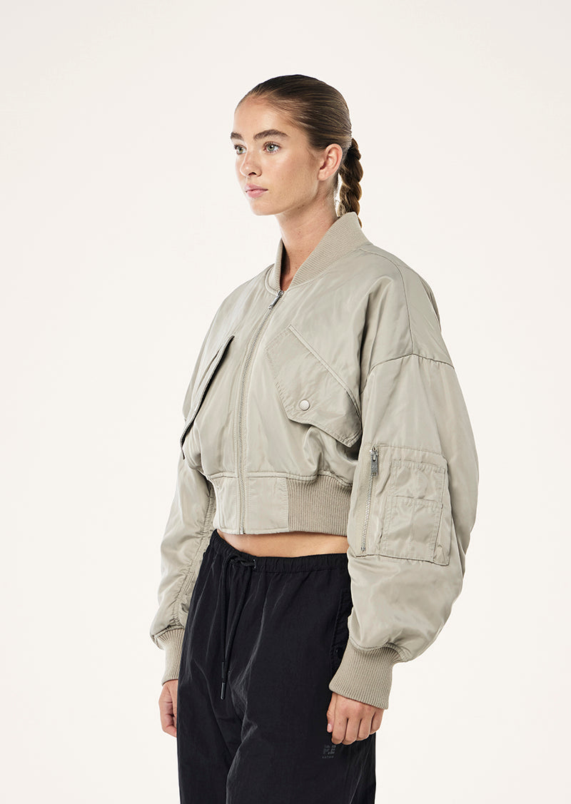 CAPTIVATE BOMBER IN BISCUIT BY P.E NATION WOMENS ATHLEISURE JACKET 