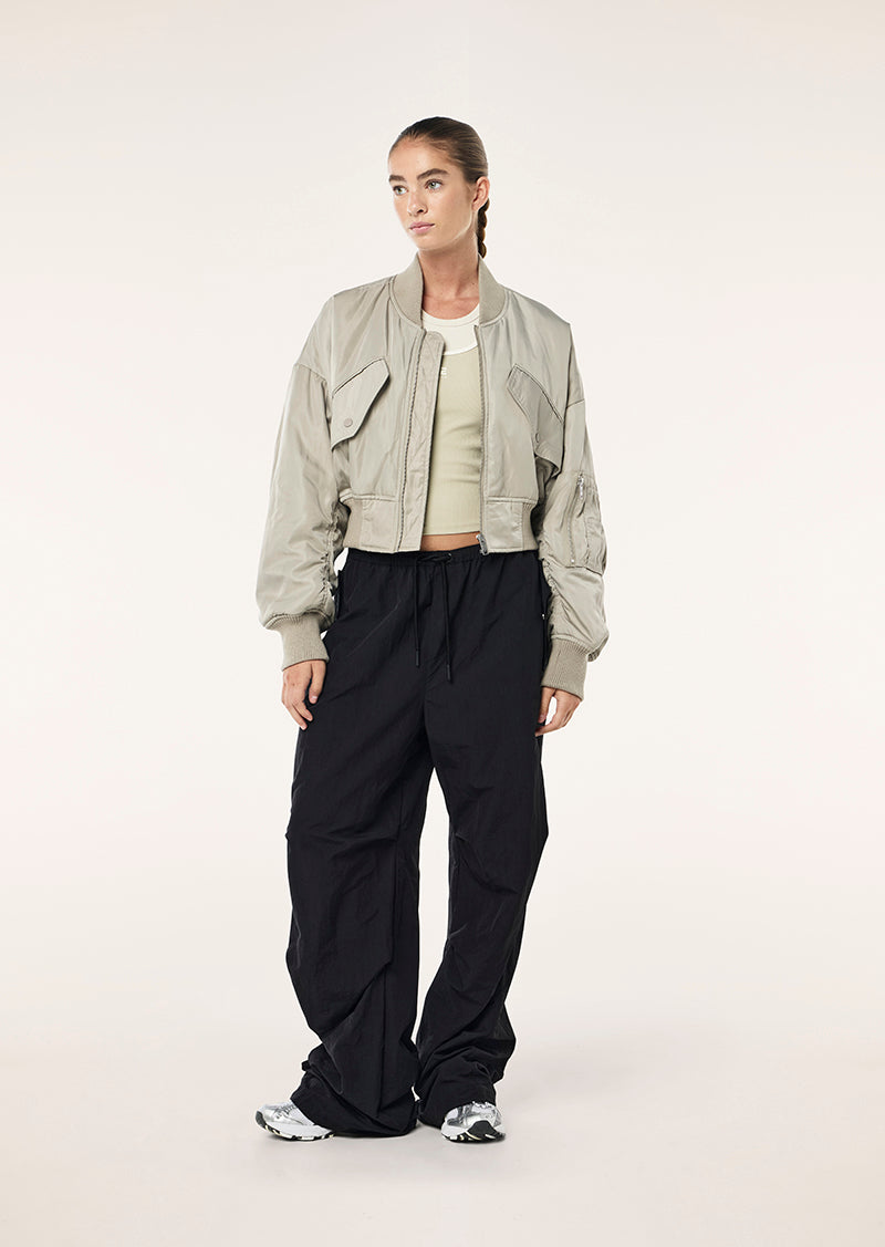 CAPTIVATE BOMBER IN BISCUIT BY P.E NATION WOMENS ATHLEISURE JACKET 