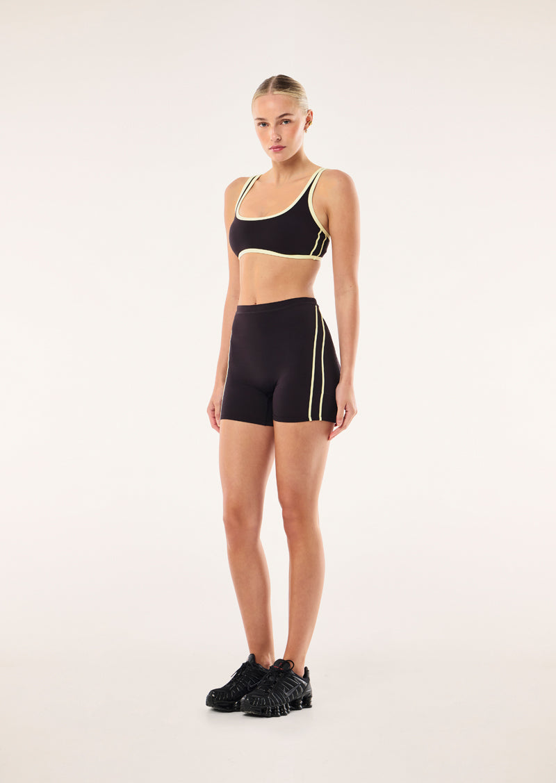 CYPHER BIKE SHORT IN BLACK BEAN AND SOFT YELLOW BY P.E NATION, WOMEN'S ATHLEISURE BIKE SHORTS