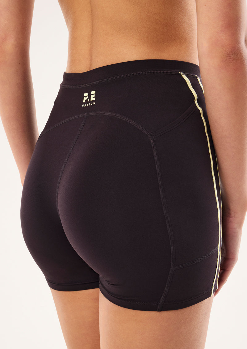 CYPHER BIKE SHORT IN BLACK BEAN AND SOFT YELLOW BY P.E NATION, WOMEN'S ATHLEISURE BIKE SHORTS