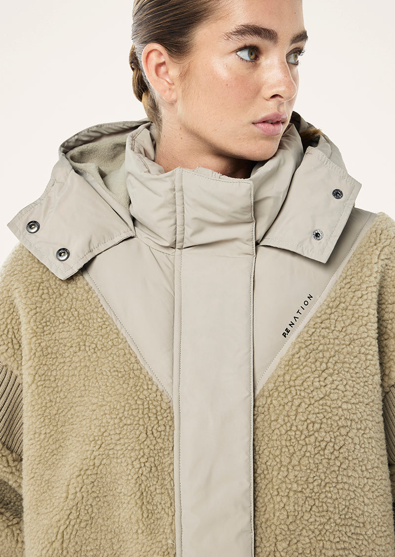 DISTRICT JACKET IN BISCUIT BY P.E NATION WOMENS ACTIVE JACKET