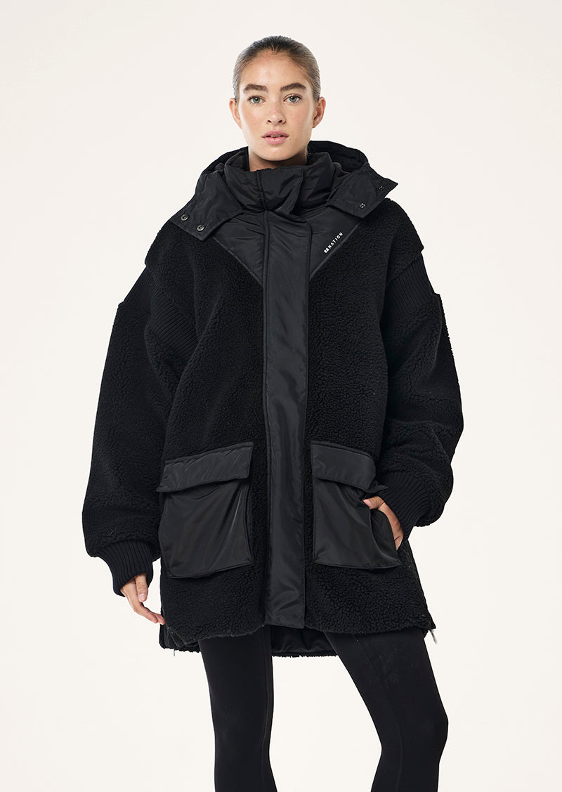DISTRICT JACKET IN BLACK BY P.E NATION