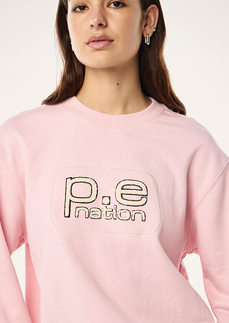 FLUX SWEAT IN CHALK PINK BY P.E NATION, WOMENS ATHLEISURE GRAPHIC SWEATSHIRT PINK