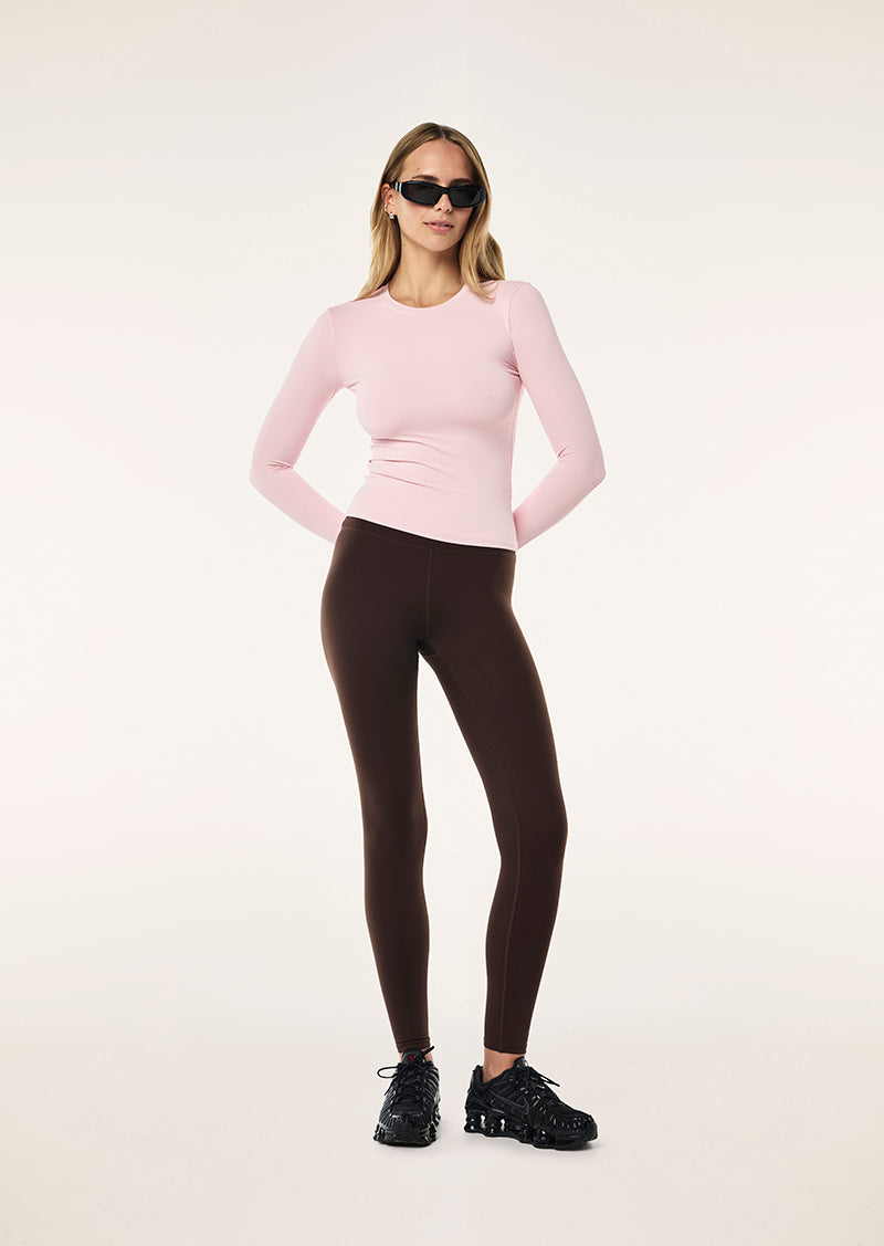 FOUNDATION LONG SLEEVE TOP IN CHALK PINK BY P.E NATION LONG SLEEVE ATHLEISURE TEE PINK