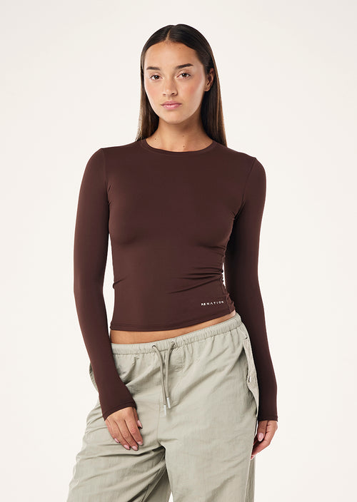 FOUNDATION LONG SLEEVE TOP IN MAHOGANY BY P.E NATION