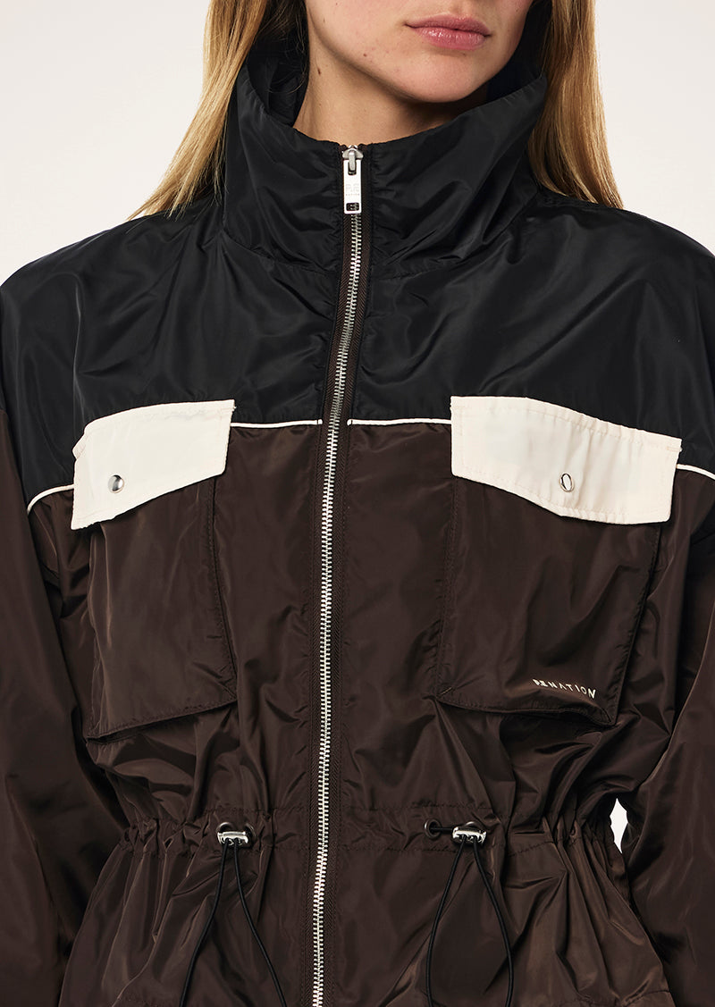 FRONTIER JACKET IN ESPRESSO BY P.E NATION, WOMENS ATHLEISURE SPRAY JACKET BROWN