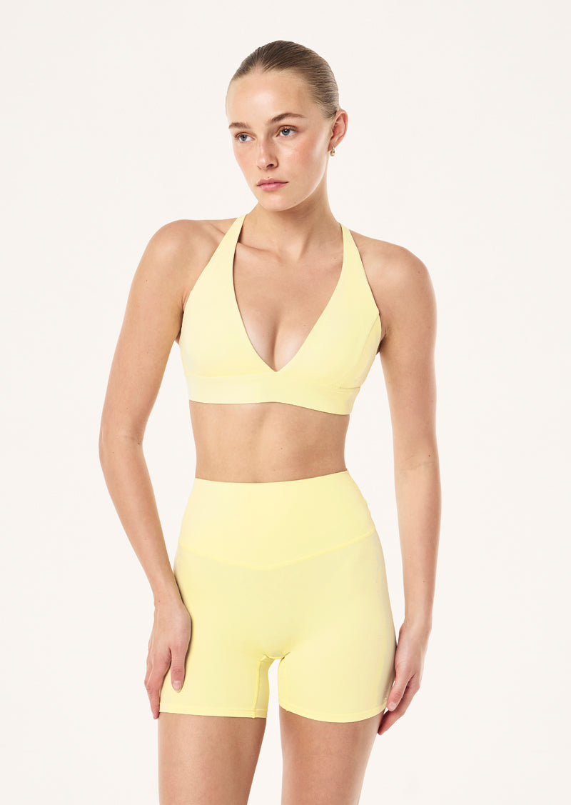 LUMEN SPORTS BRA IN SOFT YELLOW BY P.E NATION, WOMEN'S PILATES SPORTS BRA