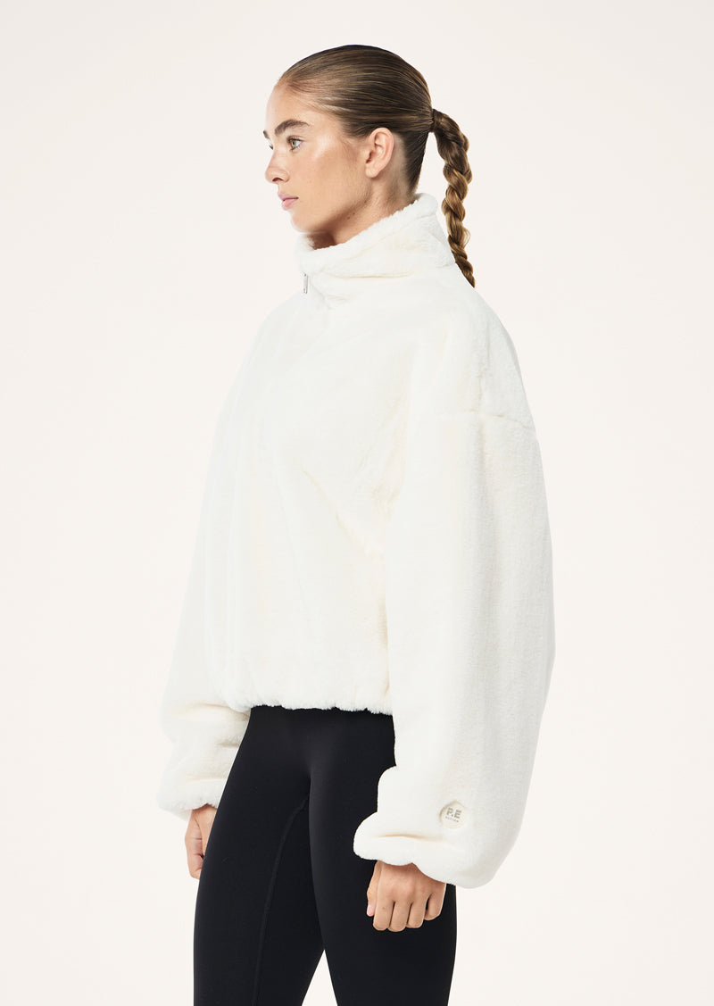 MONTEREY ZIP NECK SWEAT IN WHISPER WHITE