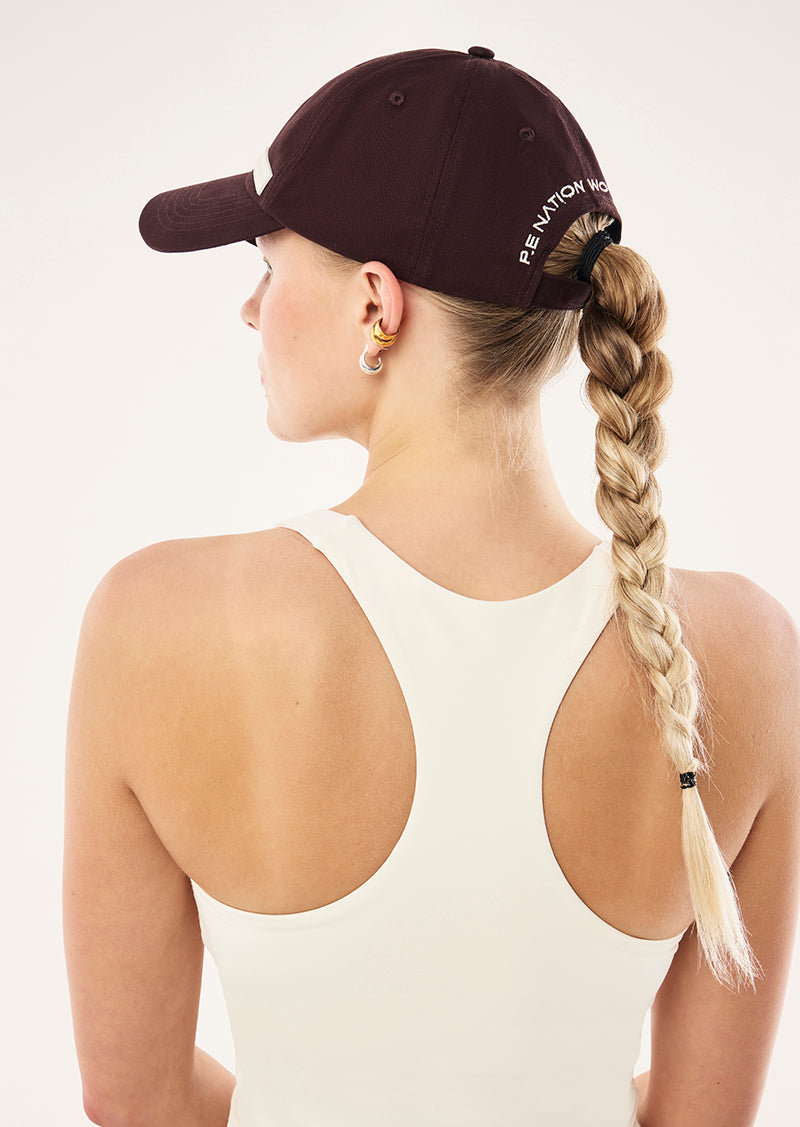 LOGO CAP IN DARK PLUM BY P.E NATION, WOMEN'S ATHLEISURE CAPS