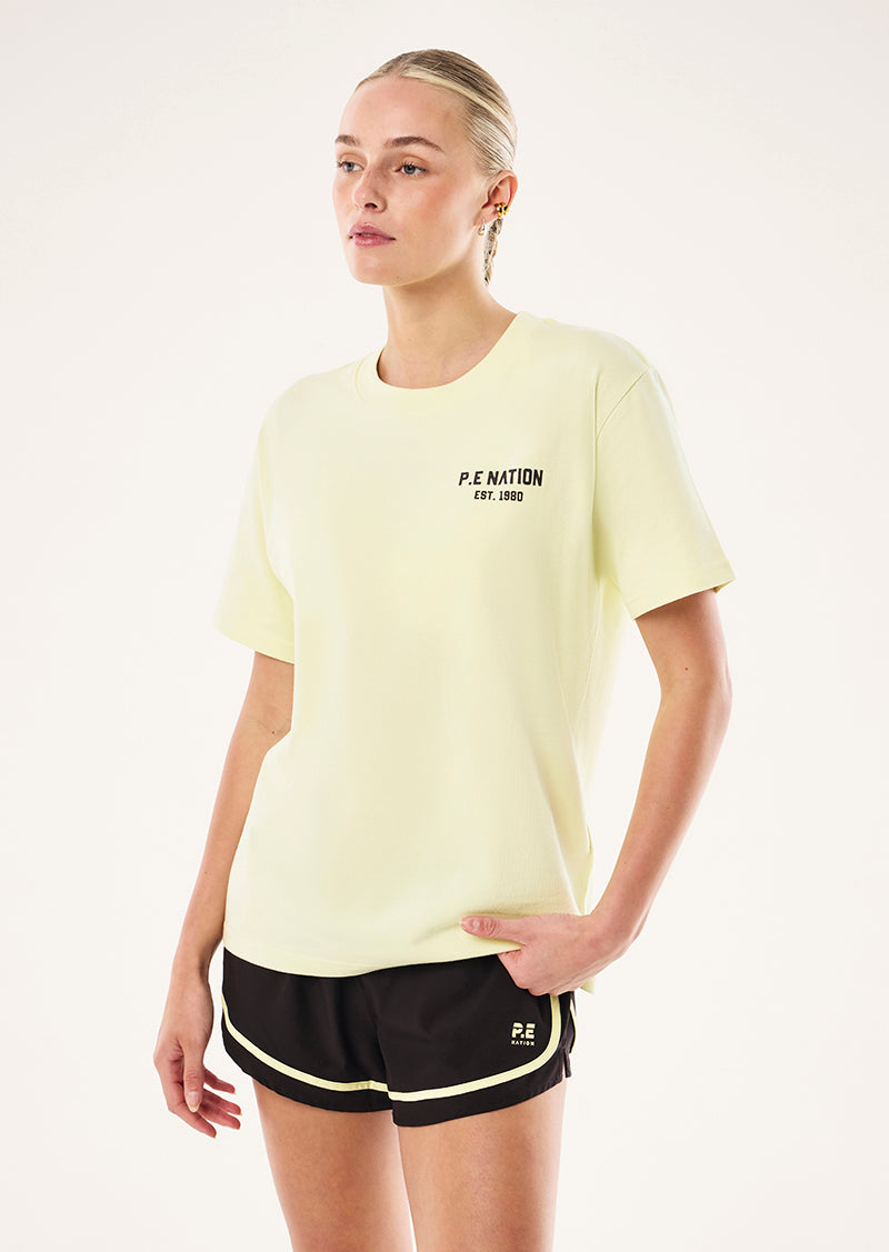 PHANTOM RELAXED TEE IN SOFT YELLOW BY P.E NATION, WOMEN'S ATHLEISURE RELAXED TEE