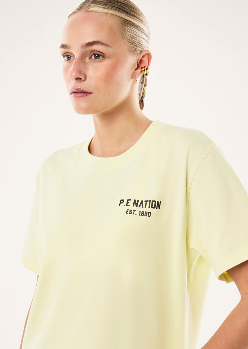 PHANTOM RELAXED TEE IN SOFT YELLOW BY P.E NATION, WOMEN'S ATHLEISURE RELAXED TEE