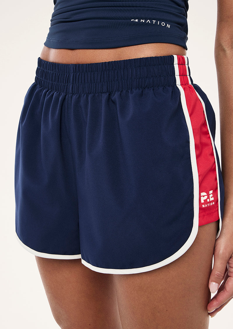 PRESET SHORT IN DARK NAVY AND STRAWBERRY BY P.E NATION, WOMEN'S ATHLEISURE RUNNING SHORTS