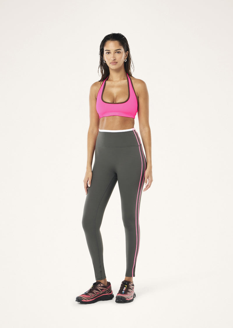 RADAR HALTER SPORTS BRA IN KNOCKOUT PINK BY P.E NATION WOMENS ATHLEISURE SPORTS BRA