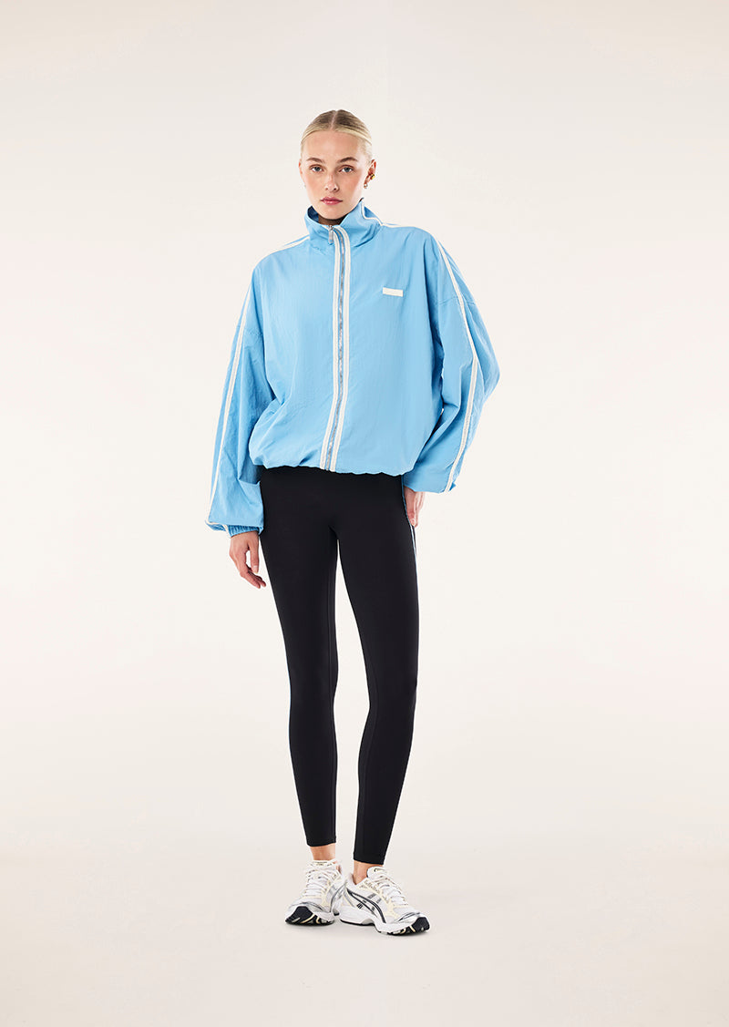 RADIUS JACKET IN ALASKAN BLUE BY P.E NATION, WOMEN'S ATHLEISURE SPRAY JACKETS