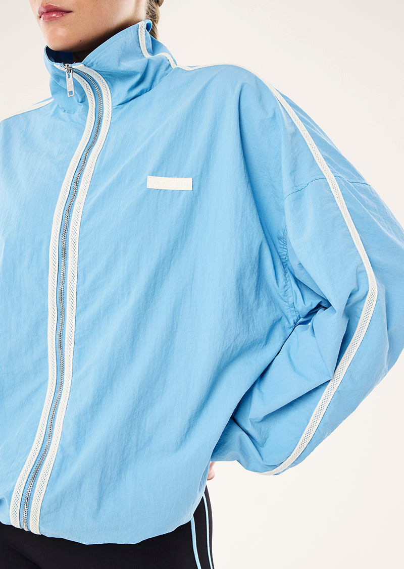 RADIUS JACKET IN ALASKAN BLUE BY P.E NATION, WOMEN'S ATHLEISURE SPRAY JACKETS