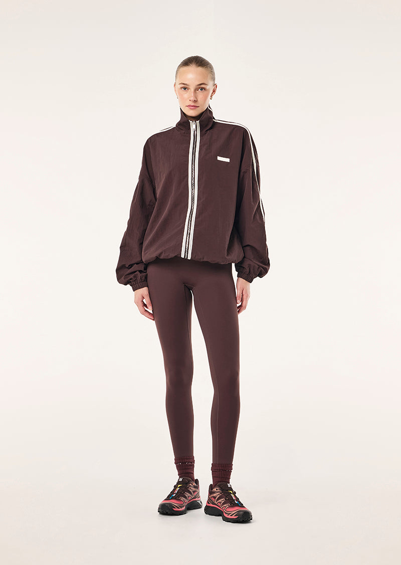 RADIUS JACKTET IN DARK PLUM BY P.E NATION, WOMEN'S ATHLEISURE SPRAY JACKETS