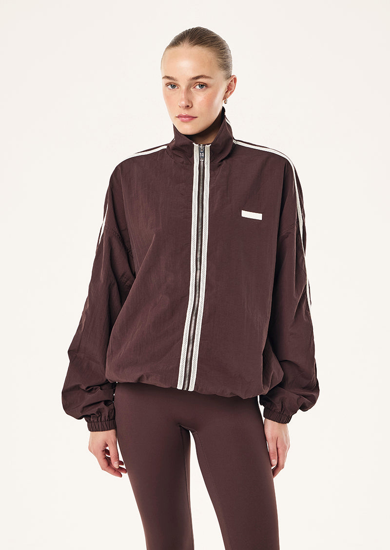 RADIUS JACKTET IN DARK PLUM BY P.E NATION, WOMEN'S ATHLEISURE SPRAY JACKETS
