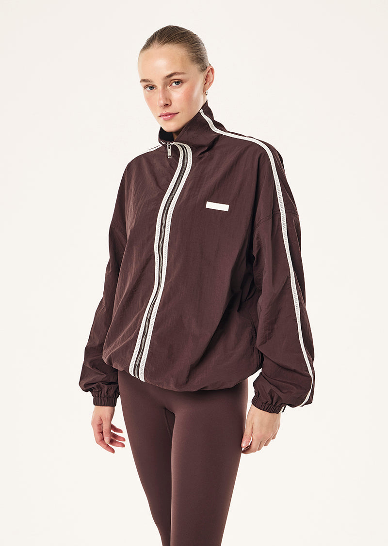 RADIUS JACKTET IN DARK PLUM BY P.E NATION, WOMEN'S ATHLEISURE SPRAY JACKETS